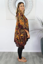 Load image into Gallery viewer, Retro Batik print mixed colours of maroon &amp; orange kaftan top.  One size fits all.
